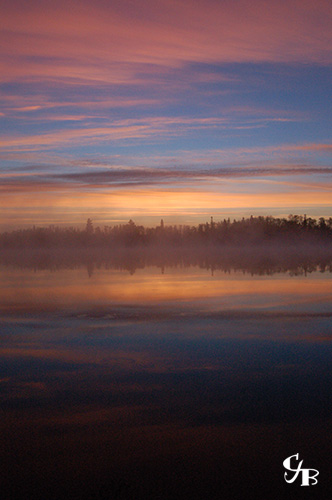 Photo: Sunrise over a brook trout lake in northern Minnesota. Photo by Chris J. Benson
