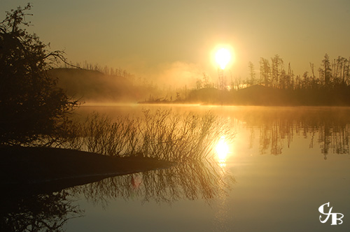 Photo: Sunrise in the BWCA in northern Minnesota. Photo by Chris J. Benson